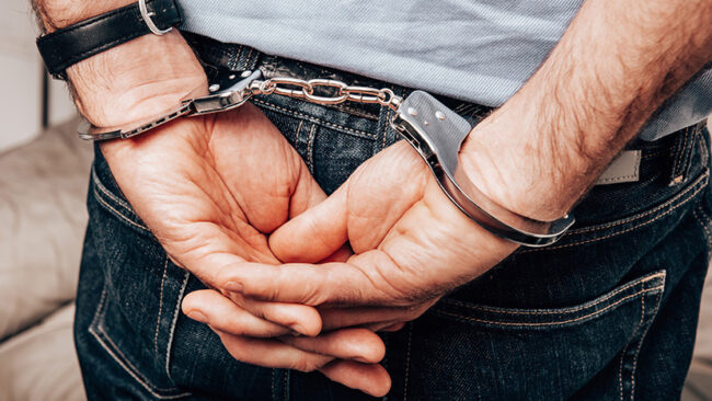 arrested man with handcuff