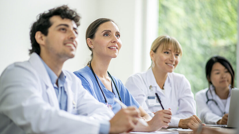 Doctors learning and working together