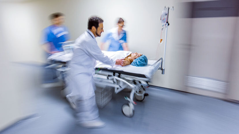 Hospital staff rushing patient