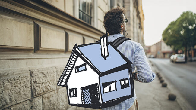 Man with backpack walking in the city